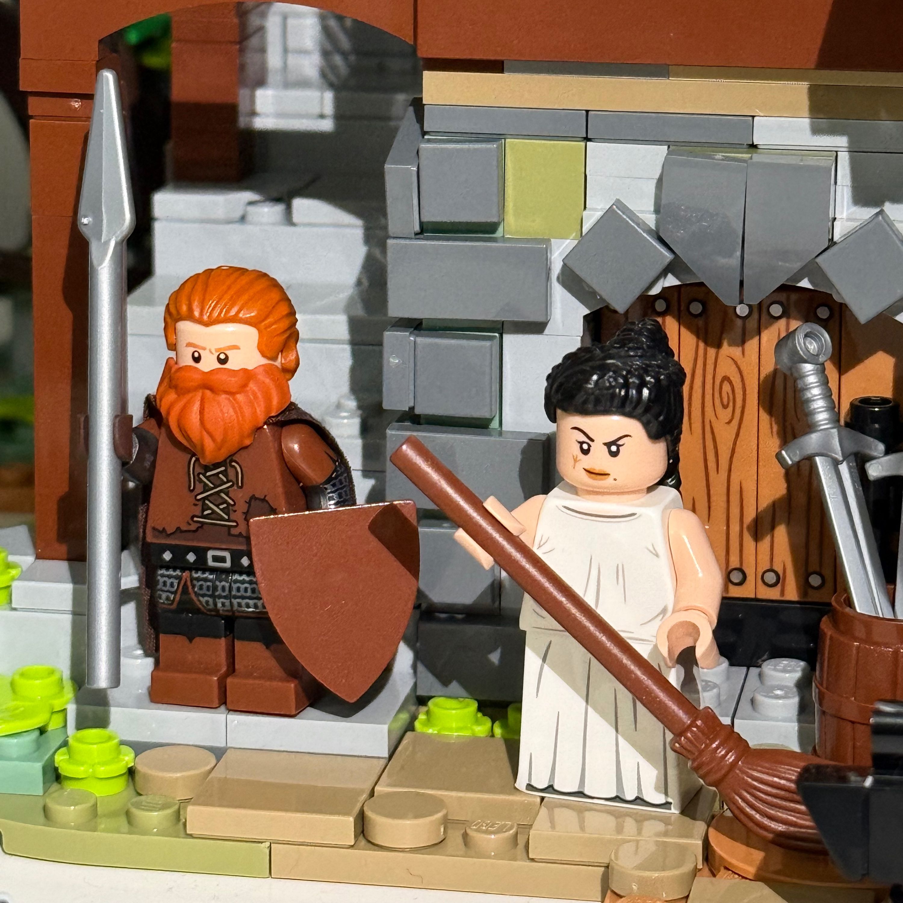 Saxon Shop Guard and Service Maid — a brick-built scene by @legovoivode, from the world Medieval Romania