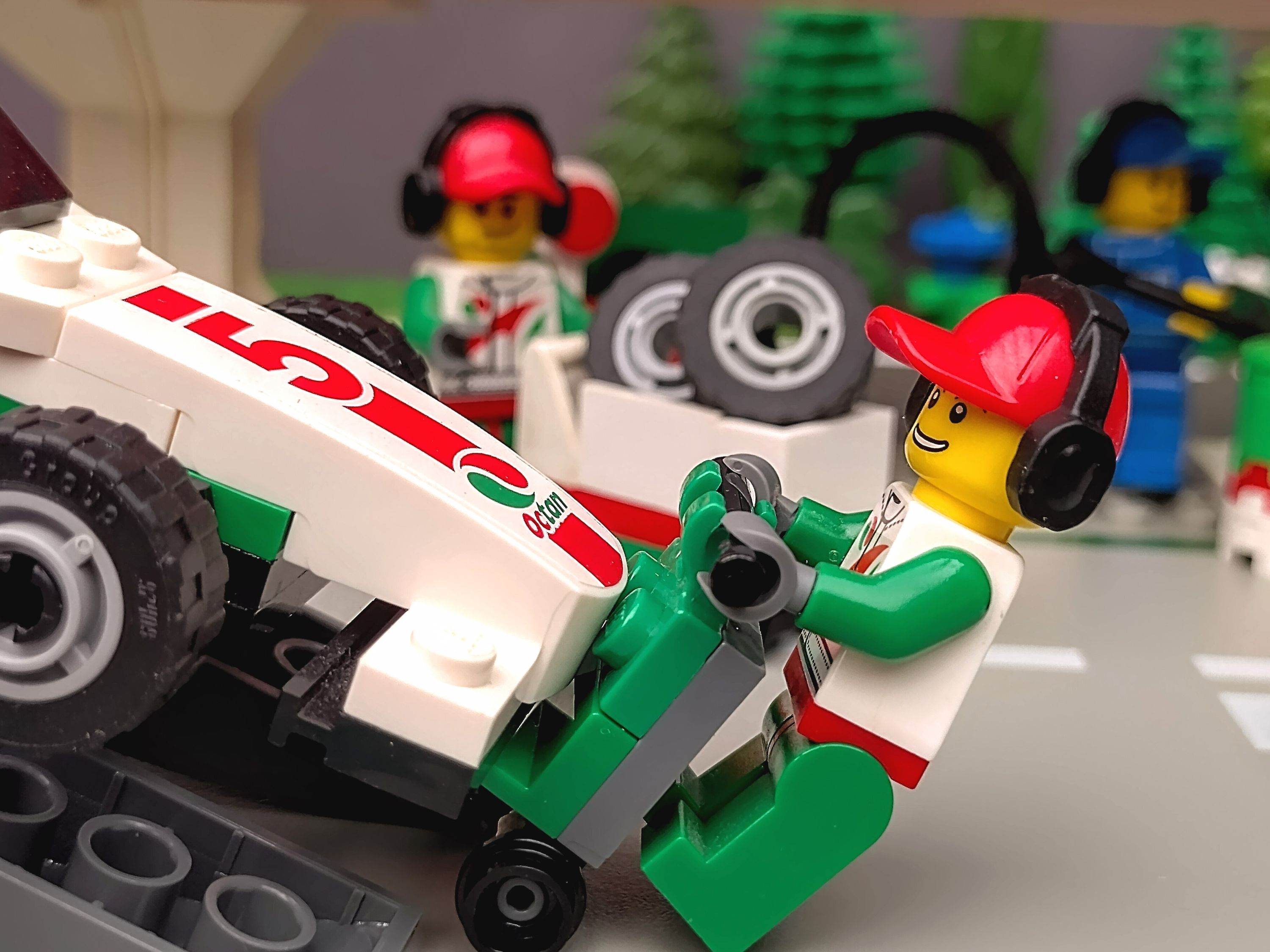 Easy does it, that car's expensive! — a brick-built scene by @pixalixbrix, from the world Victory Lap Raceway