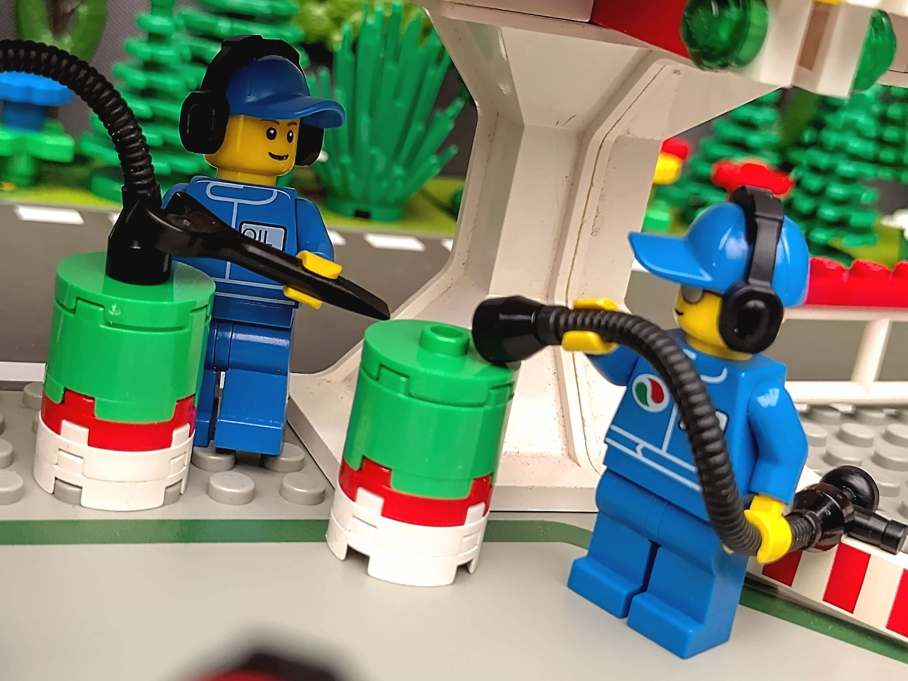 Fuel technicians fixing up the barrels. — a brick-built scene by @pixalixbrix, from the world Victory Lap Raceway