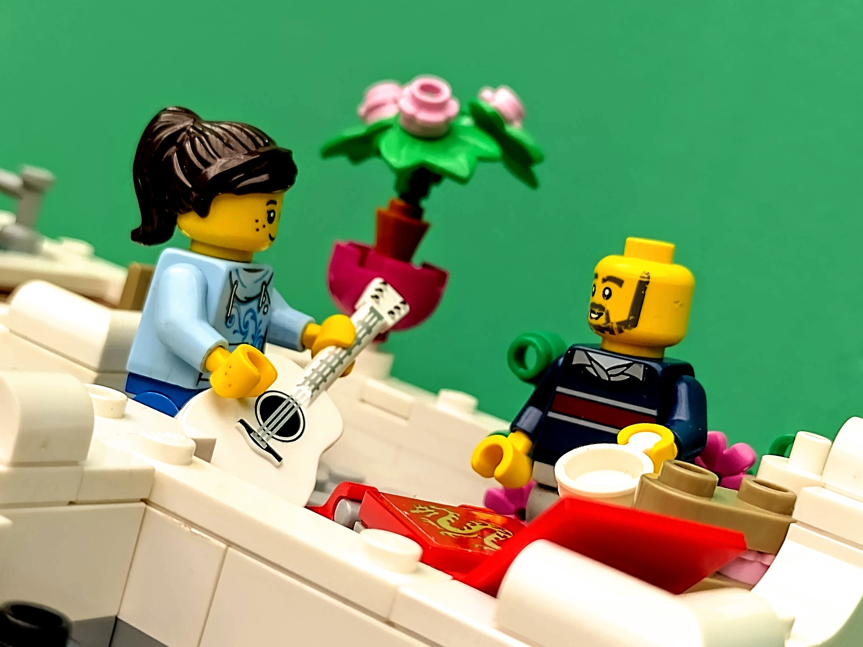 Unseen from street-level, rooftop guitar lessons serenade the minifigs below. — a brick-built scene by @pixalixbrix, from…