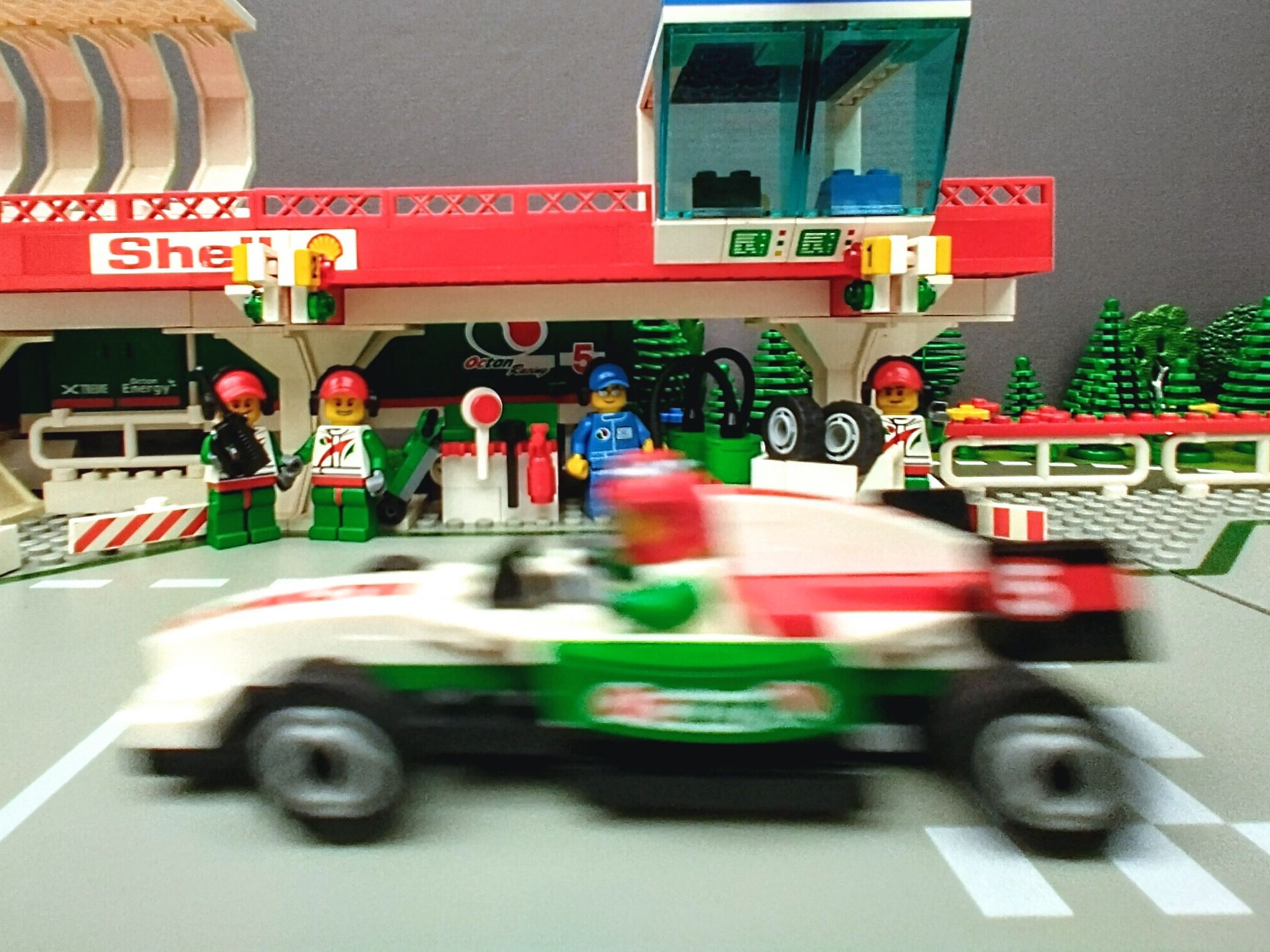 Zoom zoom! Go Octan Racing Team!! — a brick-built scene by @pixalixbrix, from the world Victory Lap Raceway