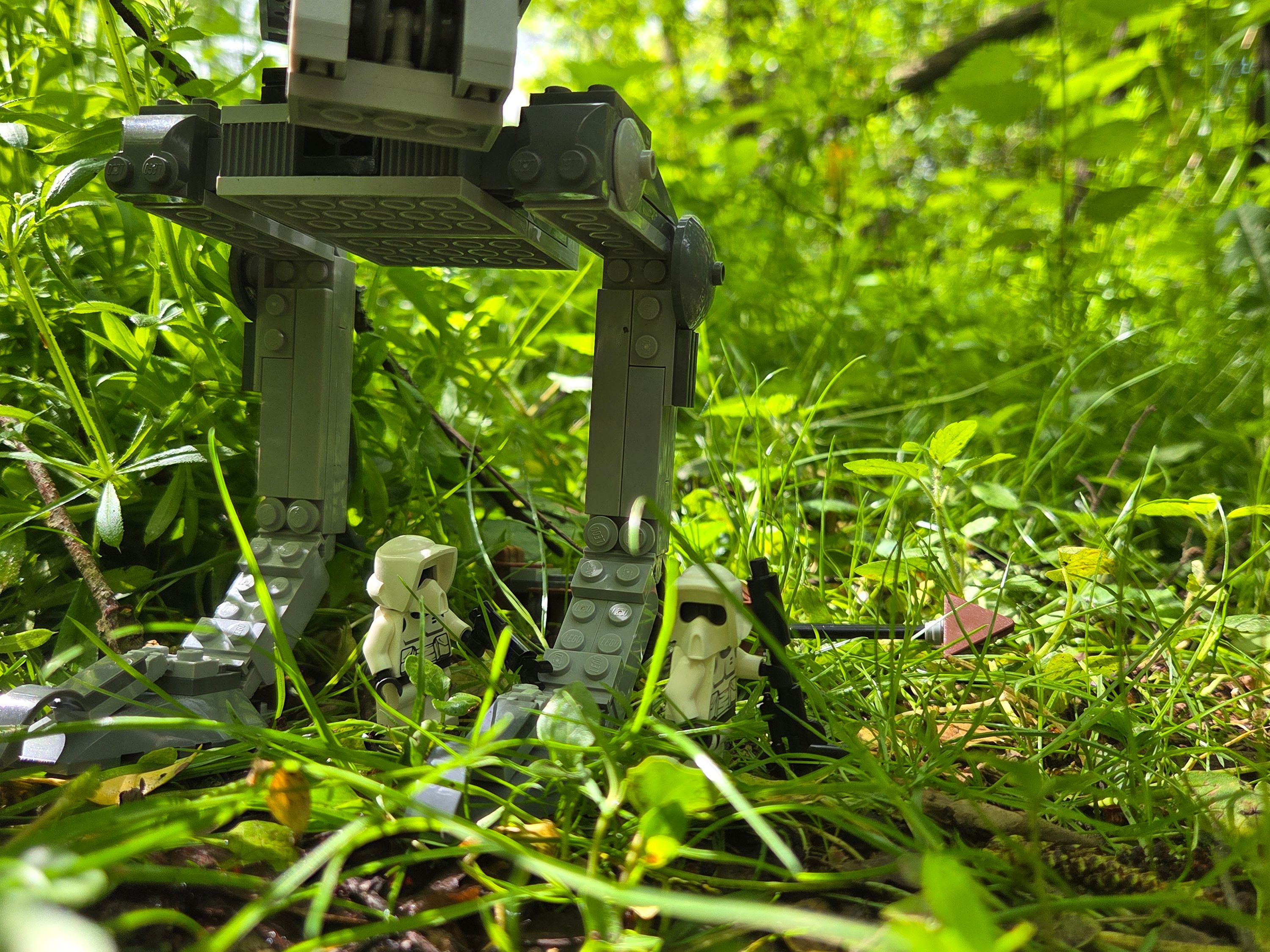 A quick bit of maintenance on the AT-ST — a brick-built scene by @khaiekdvoukdamezhniy, from the world Star Wars - Endor
