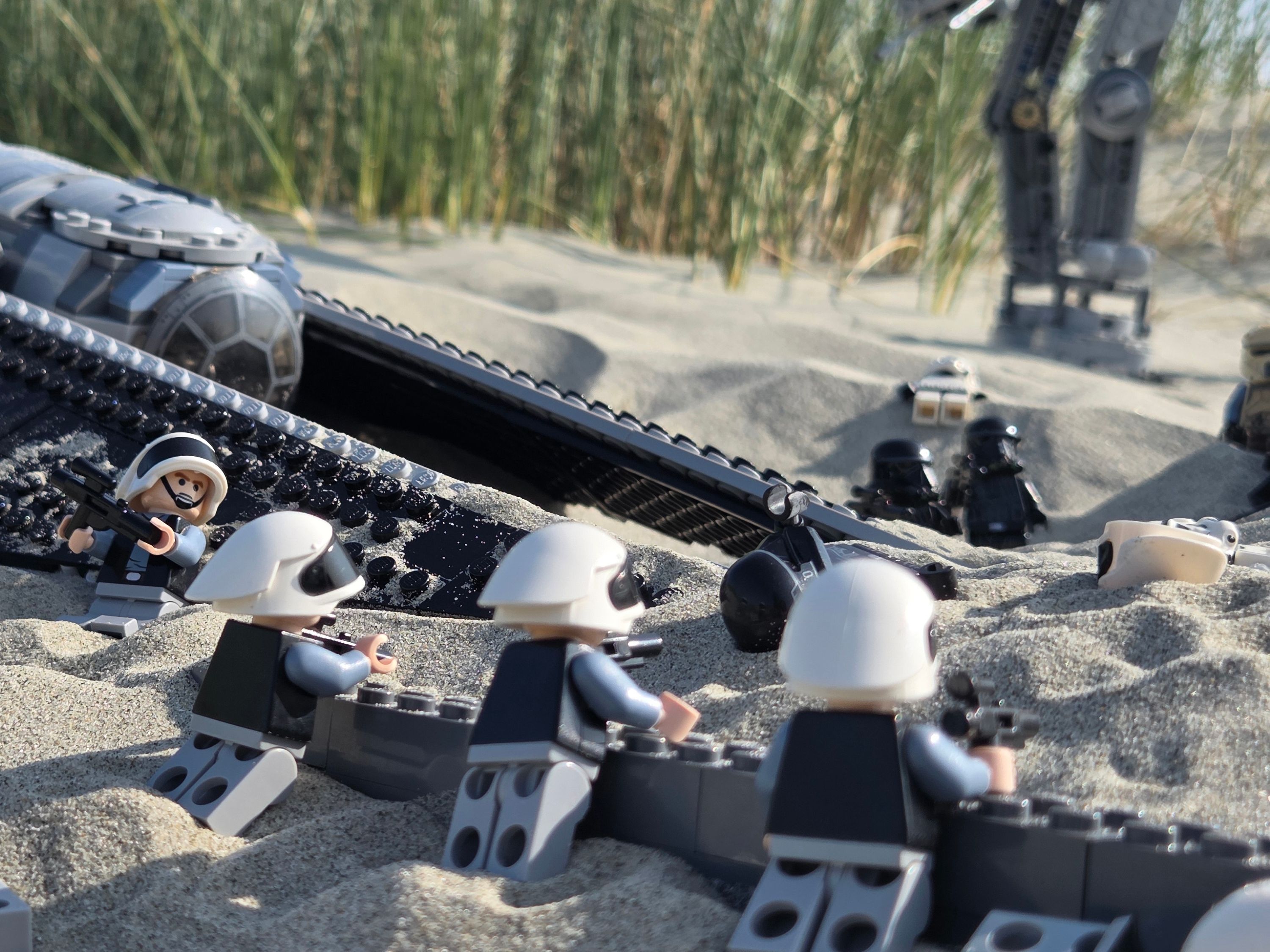Taking cover behind a downed TIE Striker. — a brick-built scene by @khaiekdvoukdamezhniy, from the world Star Wars - Scarif